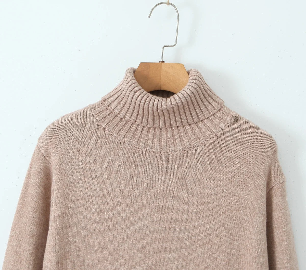 Robe pull à manches longues.