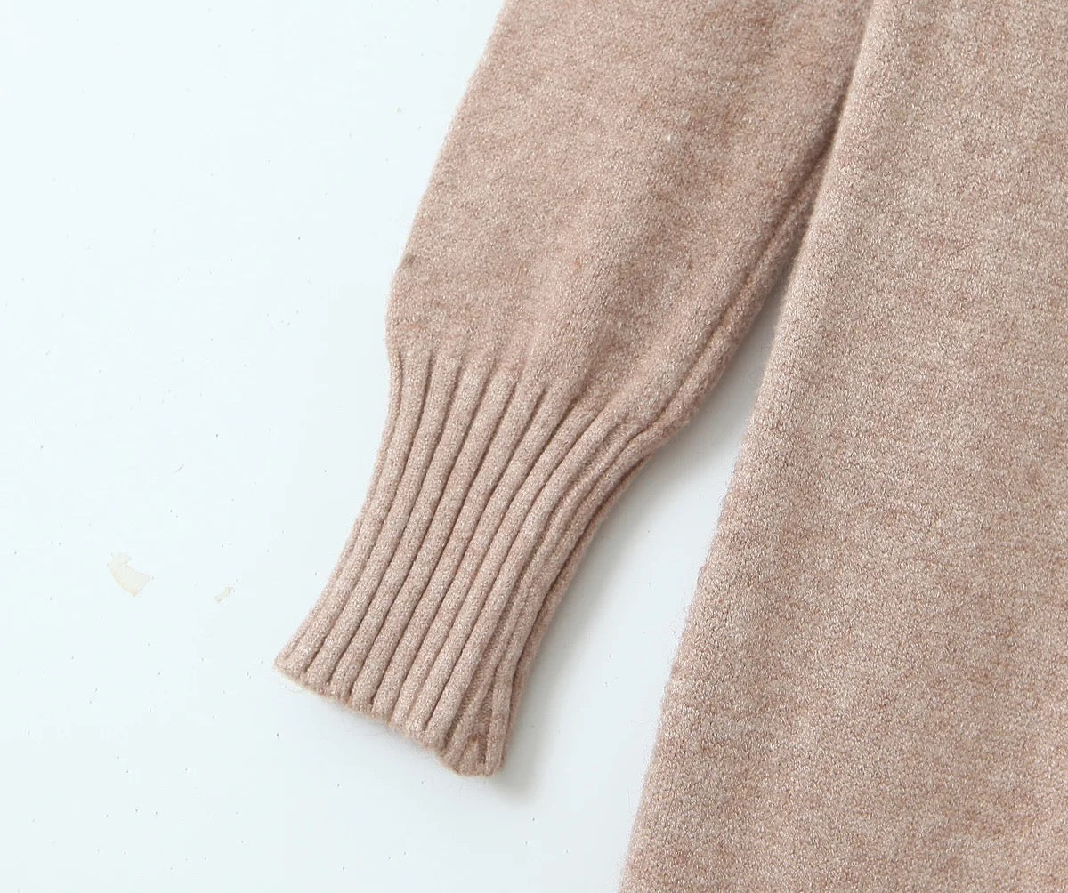 Robe pull à manches longues.