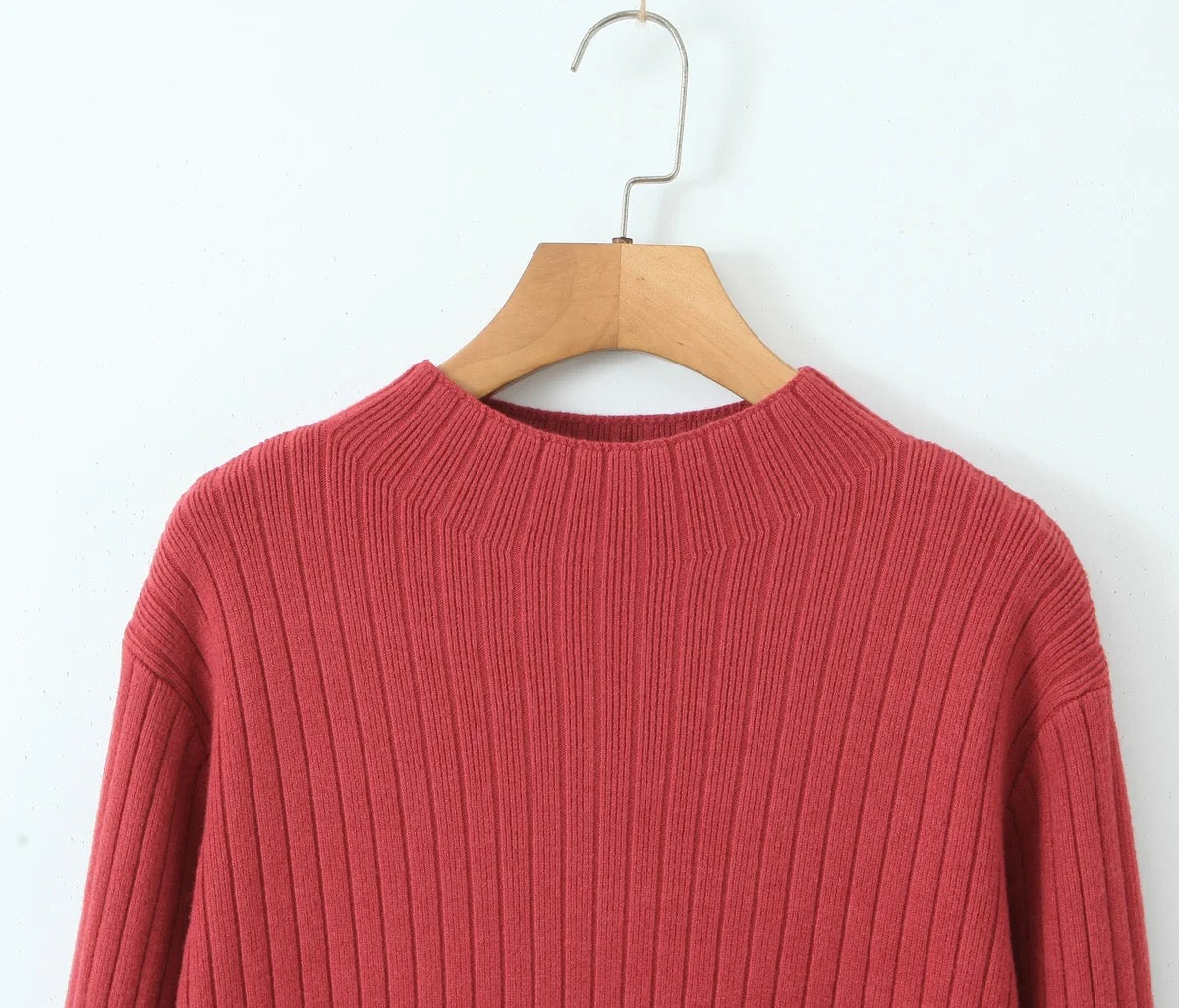 Robe pull à manches longues.