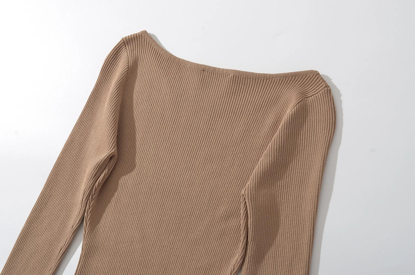 Robe longue manches à fente.